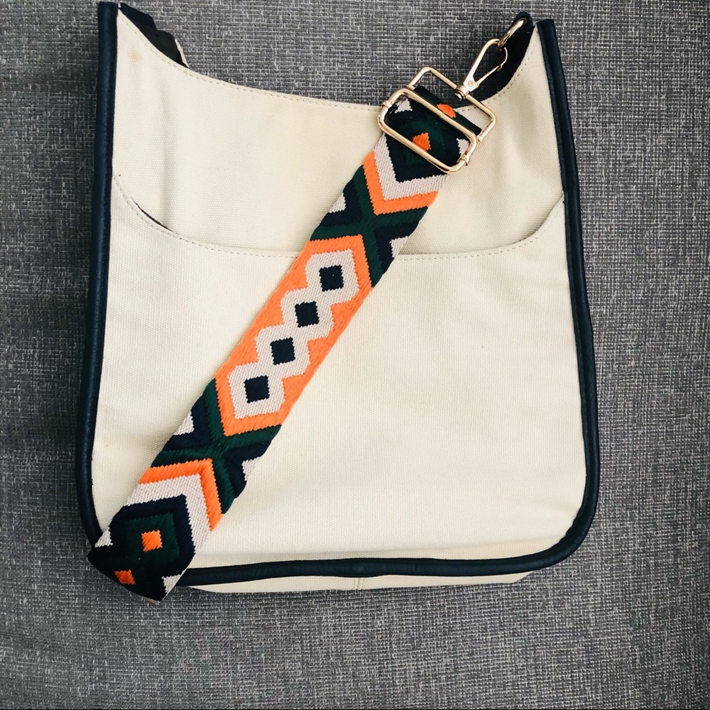 Ah-Dorned crossbody cream canvas crossbody bag piped with many trim